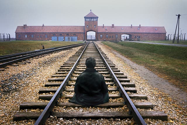 <p>Bearing witness to the Holocaust, Grover Gauntt meditates during an annual Buddhist-led retreat at the Auschwitz-Birkenau death camp</p>